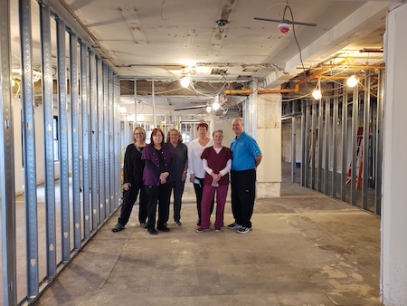 Envision Eye Care staff in new office space