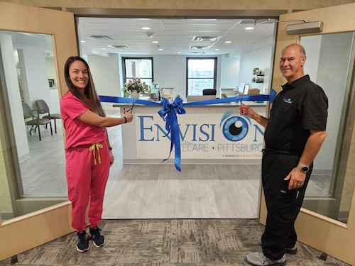 Ribbon Cutting at the entrance of the new office for Envision Eye Care